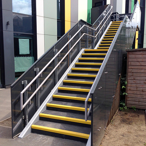 Anti-Slip Stair Treads cover existing school stairs, on high footfall areas and heavily worn steps.