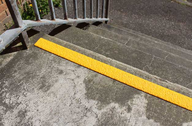Anti-slip GRP strips for concrete worn steps, improving safety. Anti-slip GRP strips for concrete worn steps, improving safety.