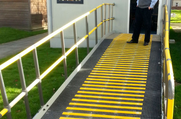 Gritted anti-slip decking strips help create a safer environment. High visibility yellow anti slip decking strips for wheelchair access.