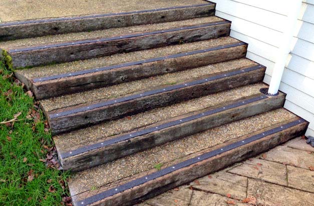 Wooden sleeper steps with hardwearing decking strips. Wooden sleeper steps with hardwearing decking strips.