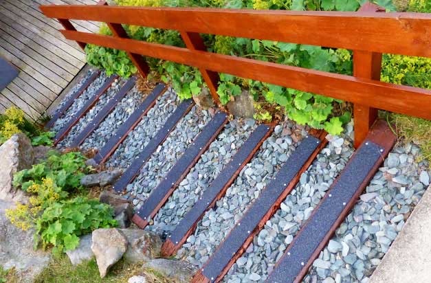 Anti-slip decking strips garden steps feature. Anti-slip decking strips garden steps feature.