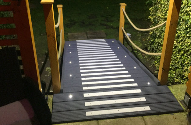 Glow in the dark, non-slip decking strips doorway entrance ramp. Glow in the dark, non-slip decking strips doorway entrance ramp.
