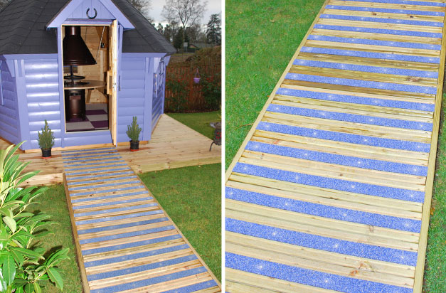 Colourdec bayside non-slip decking strips on garden summerhouse pathway. Colourdec bayside non-slip decking strips on garden summerhouse pathway.
