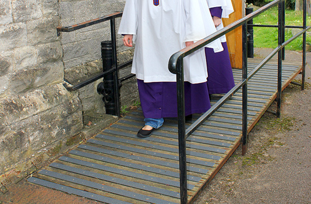 Access ramp with non slip decking strips. Access ramp with non slip decking strips.