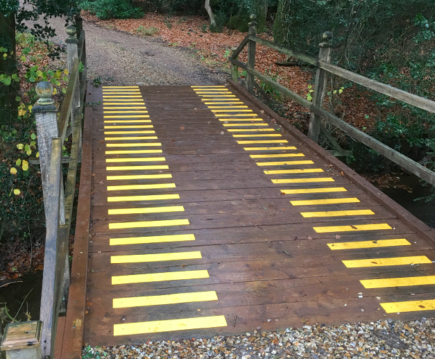 “Photos of installed anti slip products on wooden bridge to my house. They are nice and bright and provide good grip even in the rain. I am very pleased with products.” F McLeod. “Photos of installed anti slip products on wooden bridge to my house. They are nice and bright and provide good grip even in the rain. I am very pleased with products.” F McLeod.