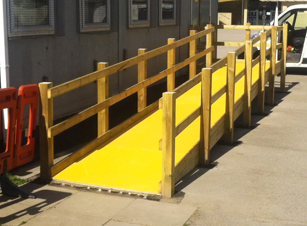Non slip floor sheets improve safety on slippery wooden access ramps. Non slip floor sheets improve safety on slippery wooden access ramps.