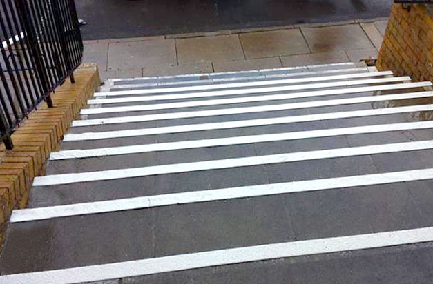 Stair Nosings offer both a colour differentiation and an anti-slip solution. Anti slip stair nosings clad concrete steps installation.