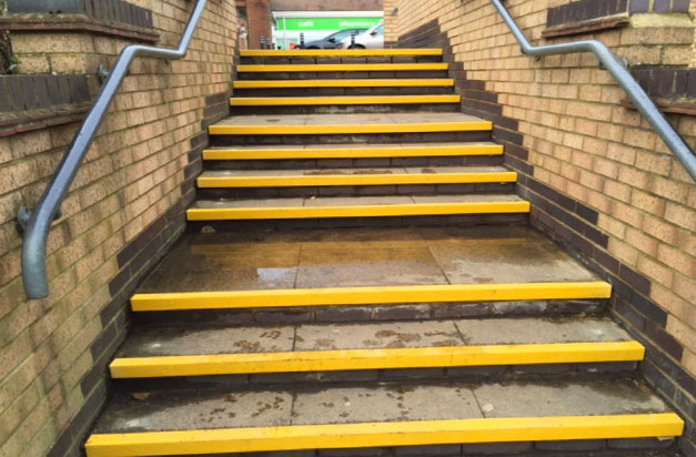 After - superstore paving steps with high visibility yellow stair nosings. After - superstore paving steps with high visibility yellow stair nosings.