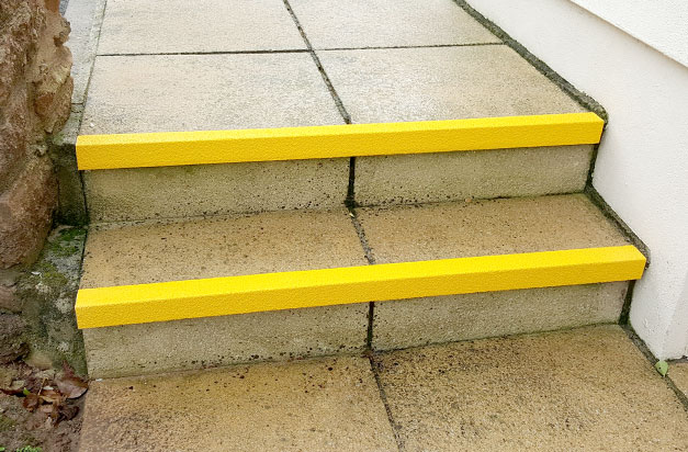 Slippery paving steps with anti-slip stair nosing. Slippery paving steps with anti-slip stair nosing.