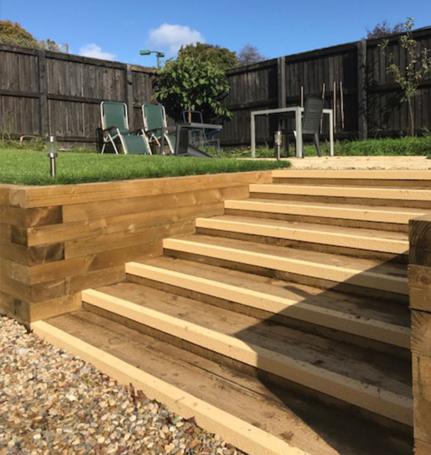 Buff stair nosing compliments the colour of timber steps for a garden landscape design. Buff stair nosing compliments the colour of timber steps for a garden landscape design.