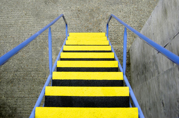 Anti-slip and high-vis stair covers installation. Anti-slip and high-vis stair covers installation.