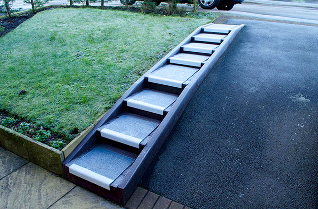 “Anti-slip Stair Treads steps fixed to lumber built on a steep drive. The steps became slippery in frost (as at the time of the photo) but the Safe Tread product removed this hazard.” B Skinner. “Anti-slip Stair Treads steps fixed to lumber built on a steep drive. The steps became slippery in frost (as at the time of the photo) but the Safe Tread product removed this hazard.” B Skinner.