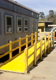 Access ramp with anti slip floor sheets. Access ramp with anti slip floor sheets.